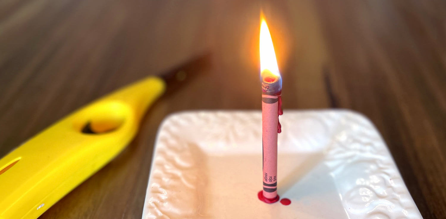 Power outage life hack: a crayon used as a candle